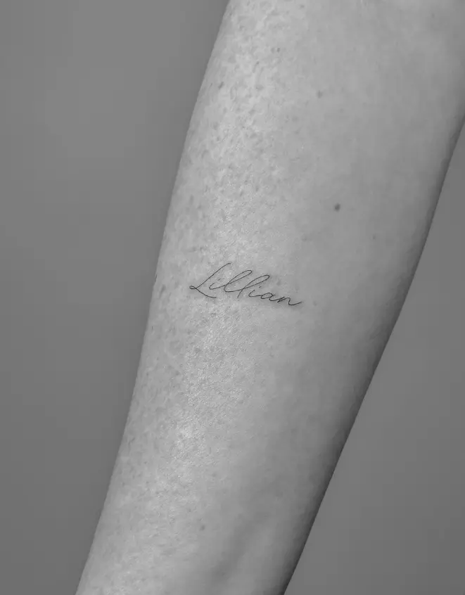 Lillian script name tattoo with elegant handwritten style by Chelsea.Q